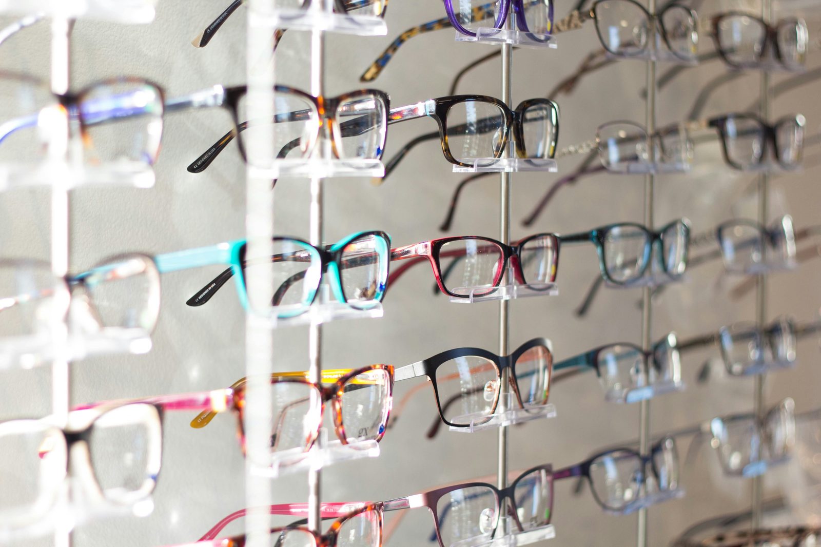A wall display of eyeglass frames.